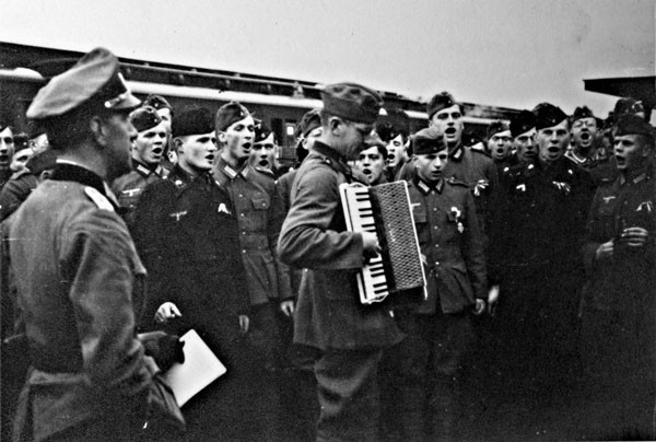 Jürgen Leading the Troops in Song with His Accordion
